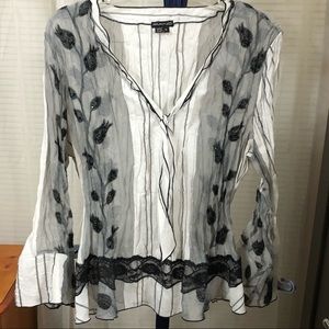White polyester blouse flower print with beading and black lace detail size XL